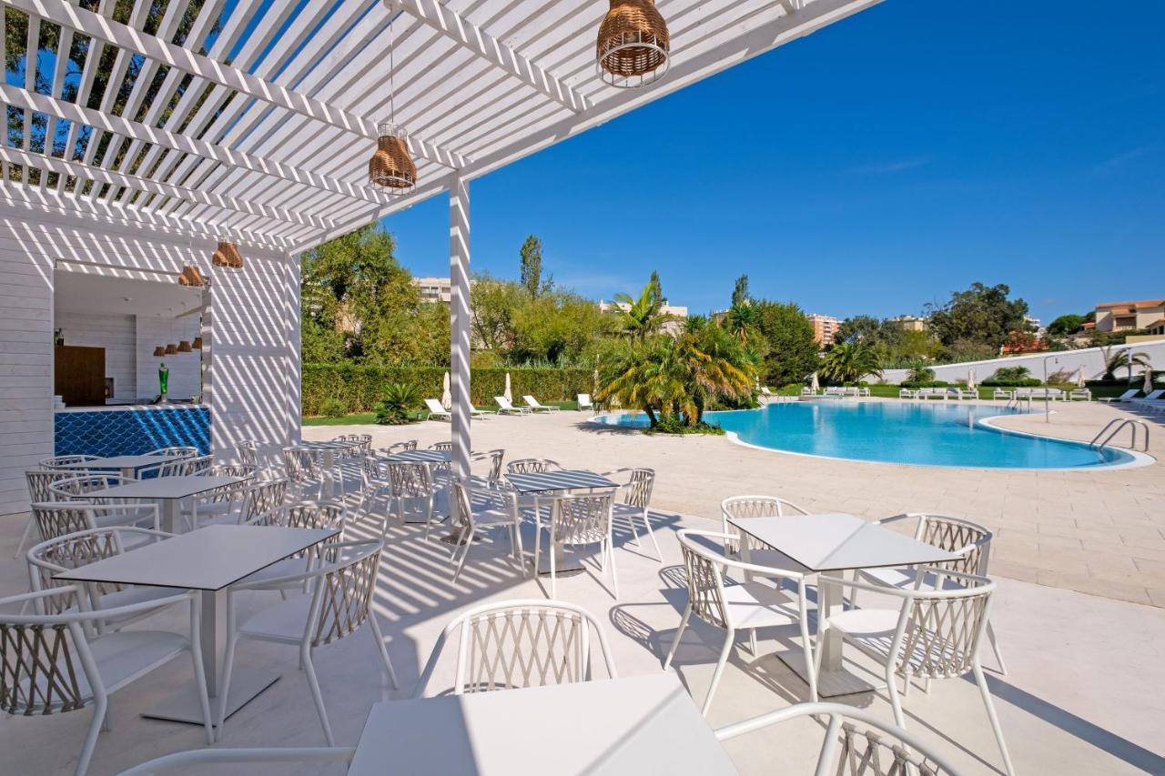 Malibu Foz Hotel - La Maison Younan Figueira da Foz Exteriér fotografie The pool at the hotel